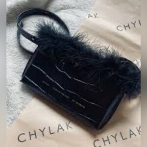 Chylak bag feather trim crock black embossed leather